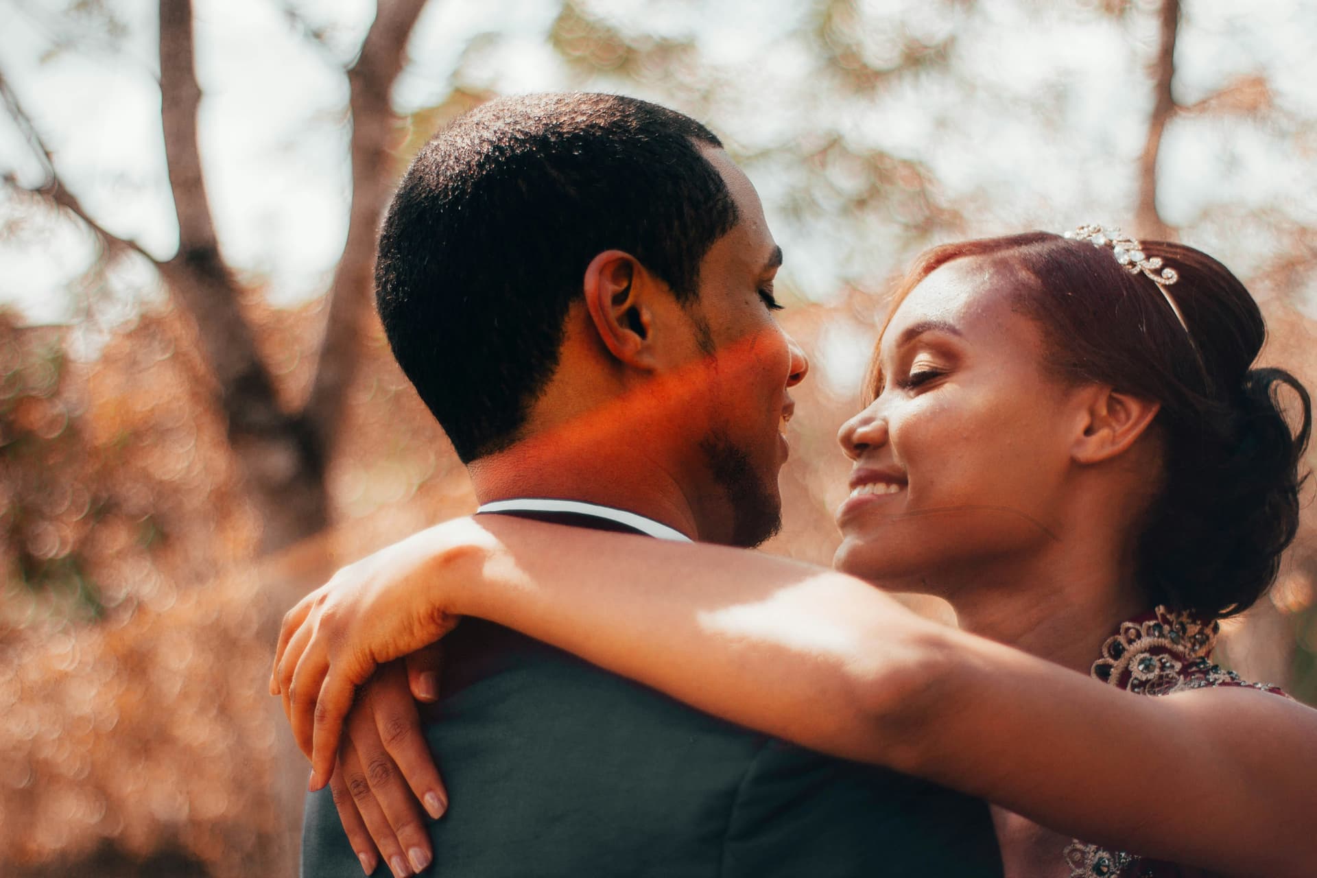 Two people on a date, smiling and enjoying each other's company