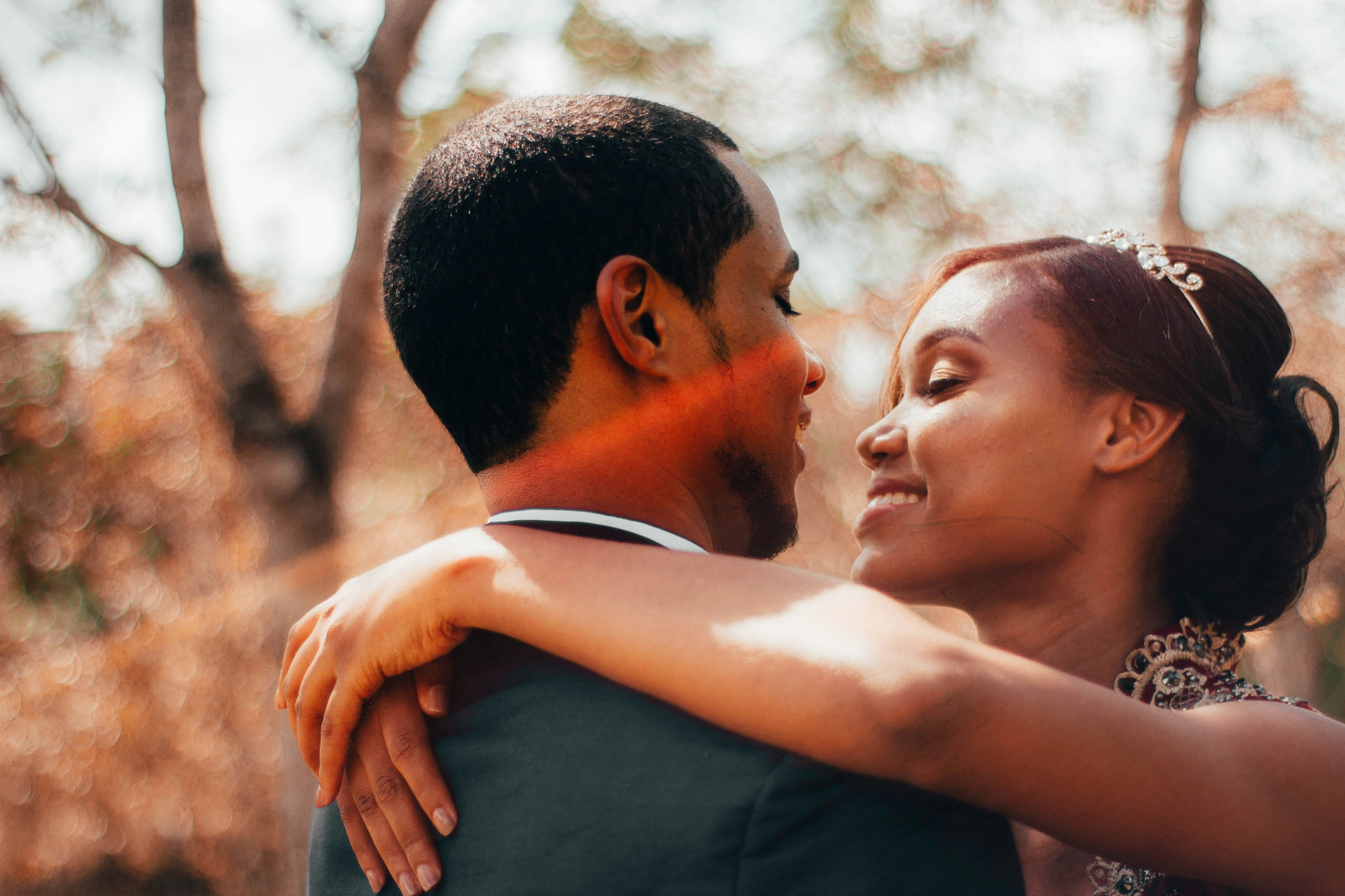 Two people on a date, smiling and enjoying each other's company